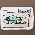 Reading on Sofa Sticker