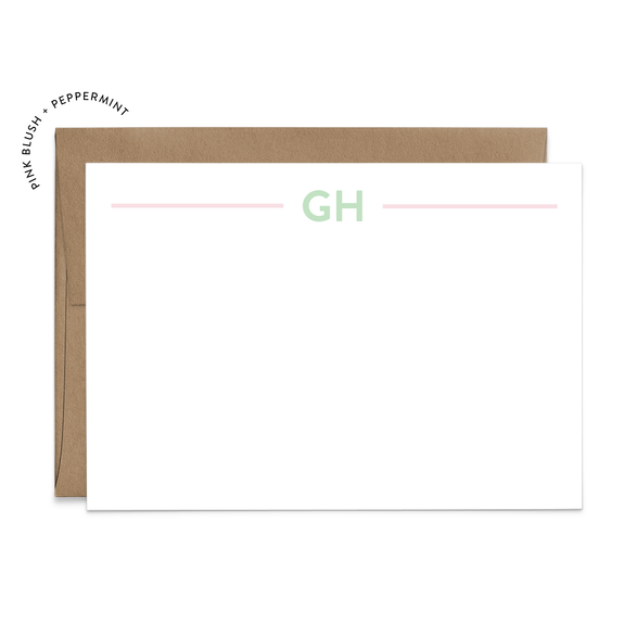 Image of a white flat note card with a kraft brown envelope. The card features a two mint lines with example initials in the middle of the lines.
