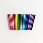 An image of a group of le pens organized in a rainbow